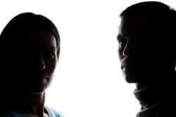 silhouette of a man and a woman with addiction issues