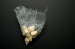 a clear plastic bag with crack cocaine